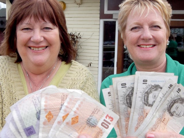 Elaine Pownell, right, Manager of The Junction at Sutton in Ashfield presented £980.15 in 2007 - raised in a sponsored Coast to Coast Cycle Ride to Carole Ibbotson, who received the money on behalf of  Cancer Research UK. Riders who took part were; Paul Fisher, Andy and Jane Young, Steve and Mel Tomlinson and Bill Roberts.