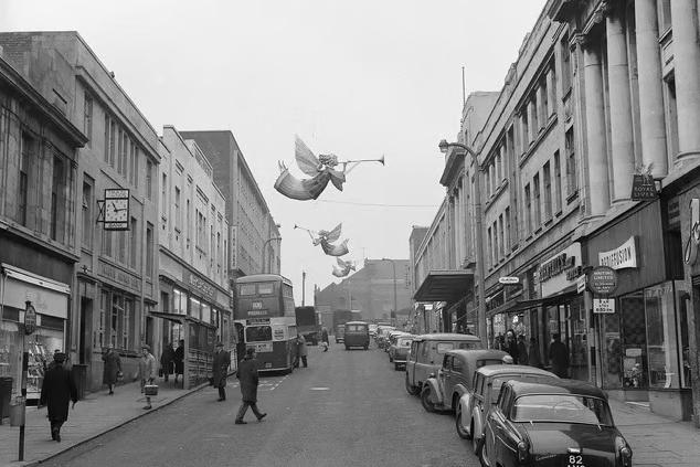Christmas angels hover over Regent Street in 1963.