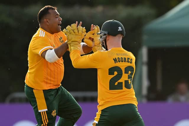Samit Patel, left, celebrates a wicket for Notts at Derbyshire's Incora County Ground in 2022.