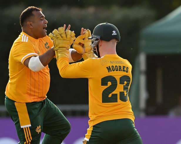 Samit Patel, left, celebrates a wicket for Notts at Derbyshire's Incora County Ground in 2022.