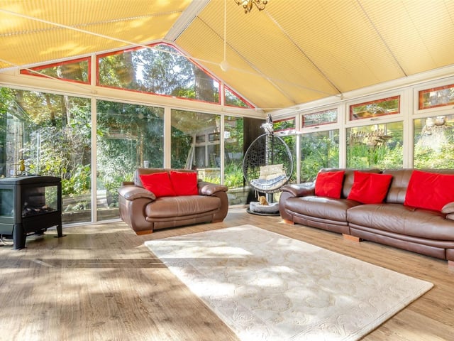One of the highlights of the ground floor is this superb, large conservatory, which was built only 12 years ago and offers stunning, unspoilt views of the south-facing garden. The floor is made of high-quality vinyl.