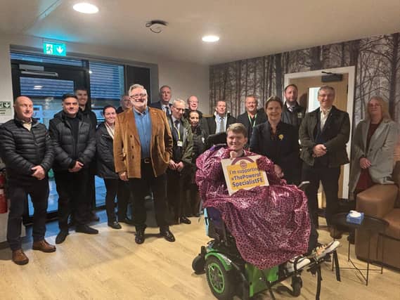 A group of Portland ambassadors and contractors gathered together to celebrate the opening of Pines together with Mayor Claire Ward.
