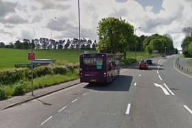 A bus heads south on the A60 away from Leapool island towards Nottingham.