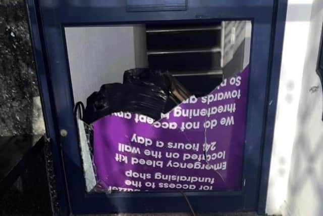 A picture of the smashed in door on Leeming Street, Mansfield.