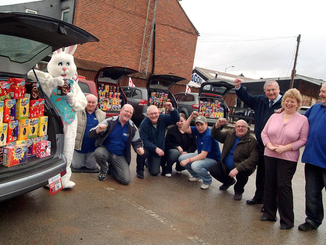 Taxi drivers getting set to deliver their 700 Easter Eggs to local schools from their Garden Road base in 2010