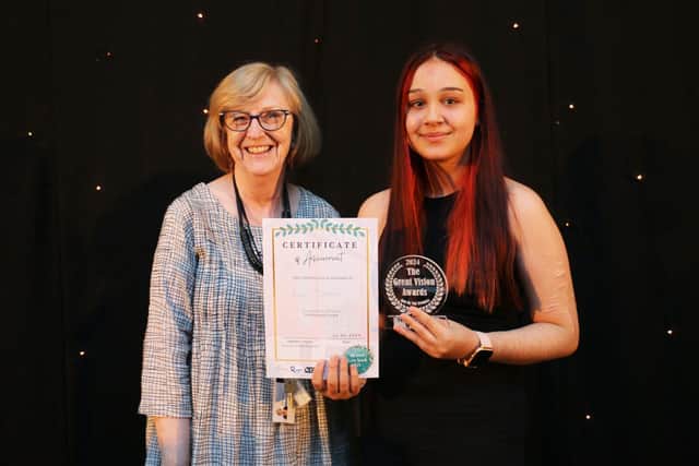 Kate Truscott presents Lacey Johnson with her principal's award
