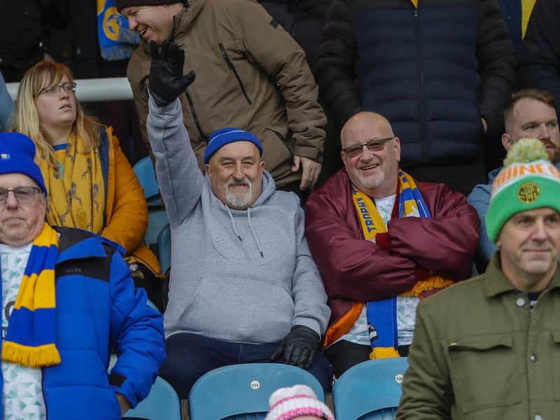 Mansfield Town fans watch the brilliant win at Peterborough United.