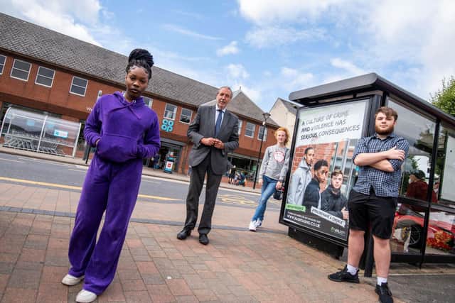 PCC Paddy Tipping with actors from the videos with one of the new campaign posters