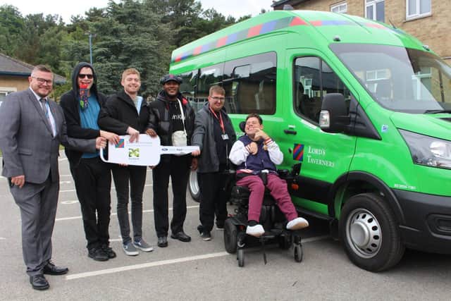 Portland Independent Living Citizens receive their minibus key