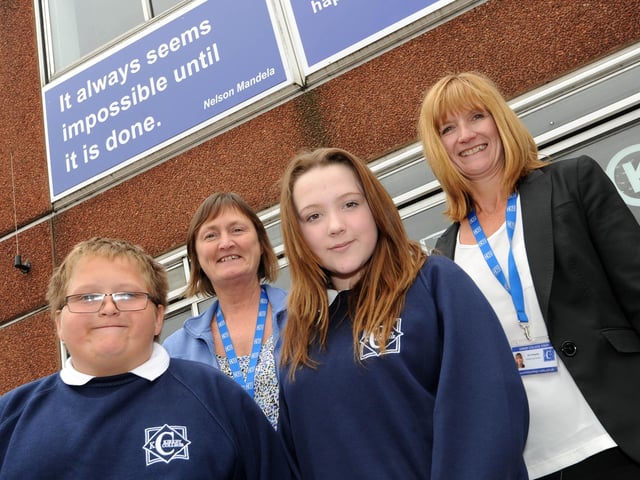 Ofsted celebrations at Kirkby College in 2013. Pictured is Janine McKenzie and Bev Blagden both acting Heads and Eddie Tearall 12 and Kia Wilde 12.
