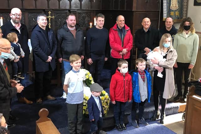 Guests at Sunday's service included 16 former Rocking babies, some of whom are pictured here with members of their families.