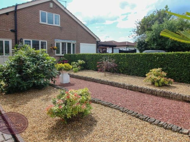 The front garden at the £375,000-plus bungalow is very easy on the eye.
