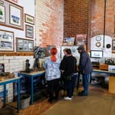 Visitors check out the many exhibits on display at Pleasley Pit Coal Mining Heritage Site. Photo by Dean Atkins.