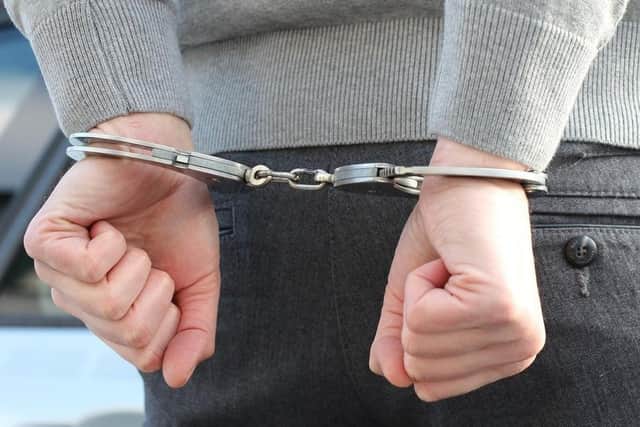 Police arrested a 31-year-old man on suspicion of assault, threats to kill, racially-aggravated public order and criminal damage.