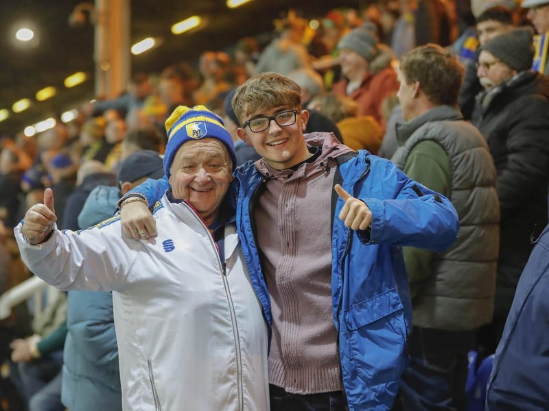 Mansfield Town fans watch the brilliant win at Peterborough United.