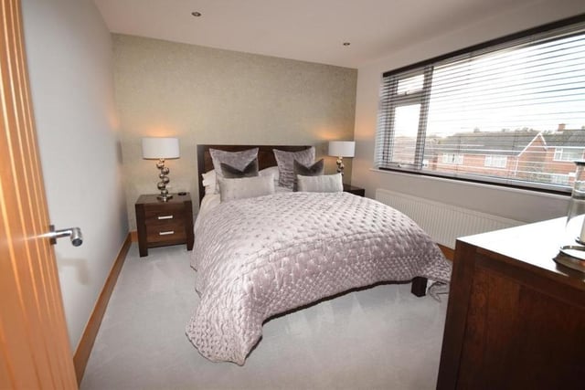 The first of the four bedrooms we look at is the master, which faces the front of the £525,000 property. Bright and attractive, it features downlighting and a radiator.