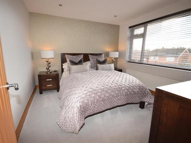 The first of the four bedrooms we look at is the master, which faces the front of the £525,000 property. Bright and attractive, it features downlighting and a radiator.