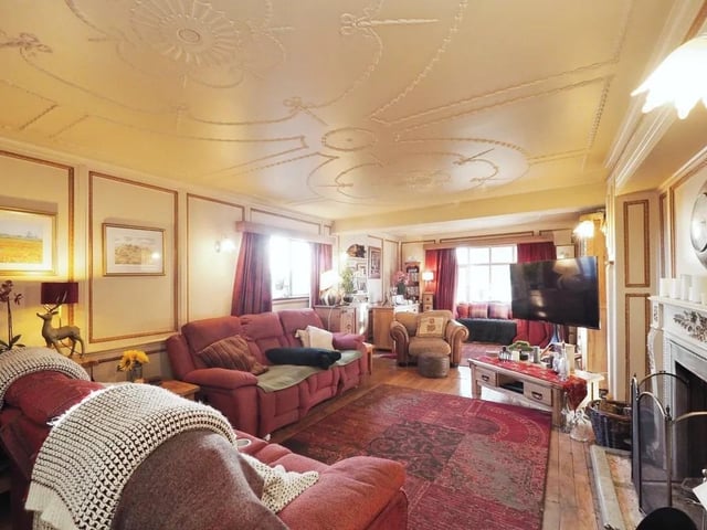 The property features coving and ornate mouldings