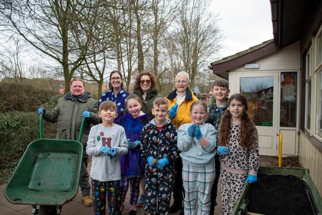 Coun Jamie Bell and Coun Rachel Madden with pupils from Kirkby Woodhouse Primary School.