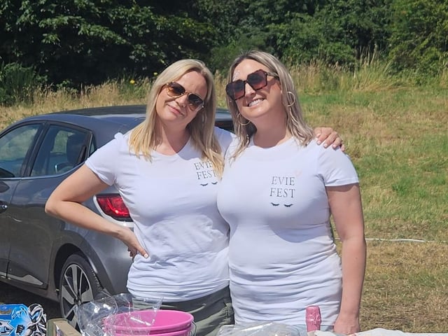 Amy Stirland-Fell and Hannah Cullen on a stall, representing EvieFest with custom made t-shirts.