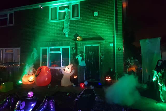 Ghosts and ghouls haunt a Mansfield Wooshouse home on Cedar Avenue at a previous Halloween celebration.