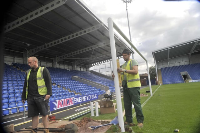 Ground Staff put up the first set of posts in the new ground.