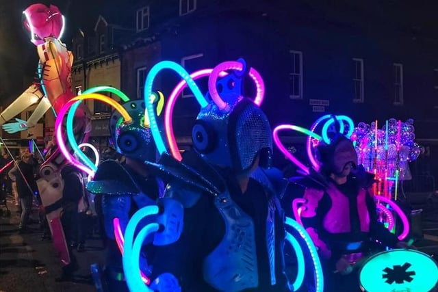 The drum troupe produced a brilliant neon light show