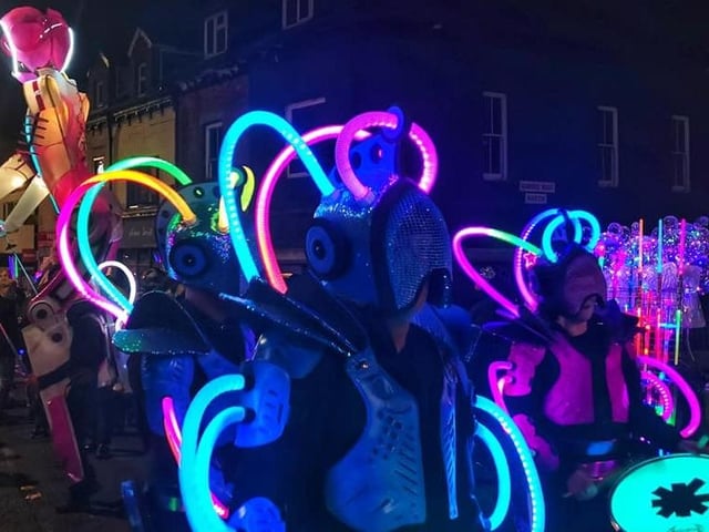 The drum troupe produced a brilliant neon light show