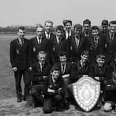 These Manor School pupils show off an impressive sports shield in 1963.