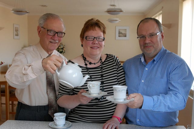 Raphael Attard and Catherine Elliot are enjoying a cuppa with David Hall at St Clare's eight years ago but what was the occasion?
