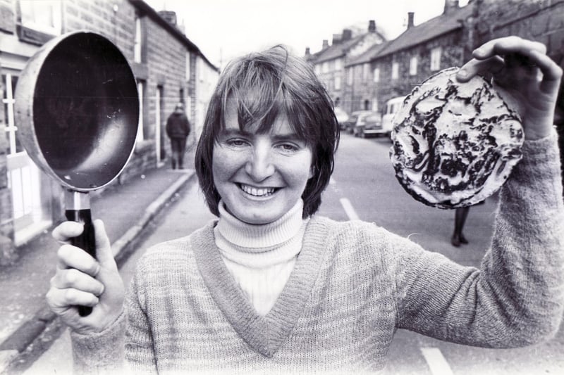 The winner of the ladies pancake race in the village of Winster, nr Matlock, is Christine Aykroyd  February 1980