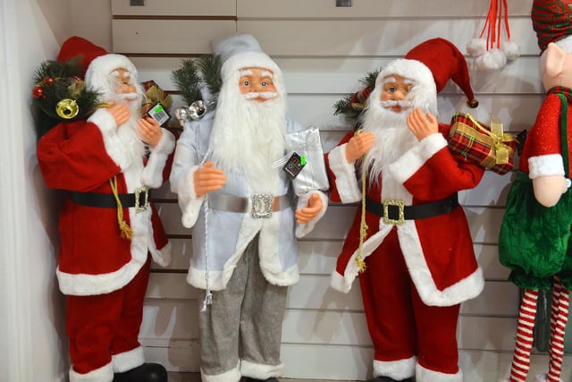 The store has lots of Santa decorations to lift the Christmas spirits.
