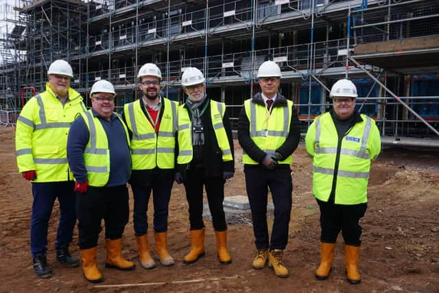 Councillors, including Council Leader Sam Smith (third from left) see first hand the progress made on site.