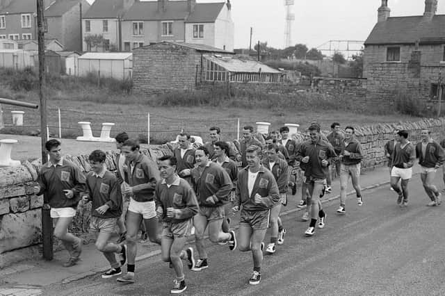Stags do a spot of road running on pre-season training in 1964.