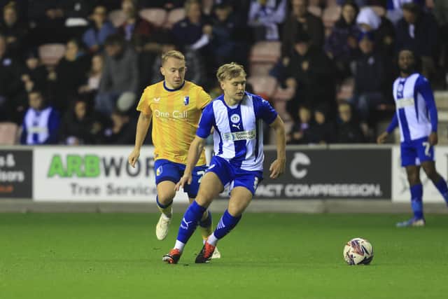 Action from the Sky Bet League One match against Wigan Athletic at the Brick Community Stadium, 22 Oct 2024, Photo credit Chris & Jeanette Holloway / The Bigger Picture.media