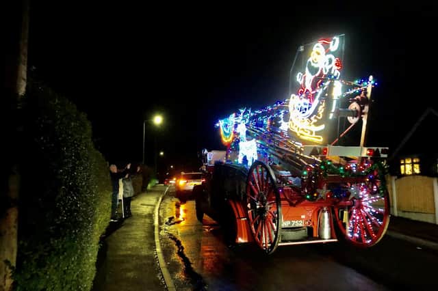 A vintage fire engine decked with Christmas lights toured the streets of Brinsley.