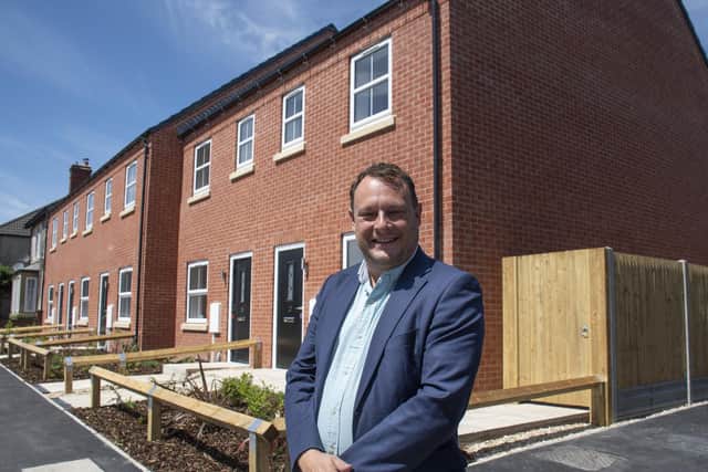 Coun Jason Zadrozny, Ashfield Council leader, outside the completed homes on Stoney Street.