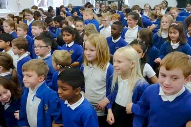 Children at Springbank Academy in Eastwood just over a year ago, rehearsing a song that they produced to raise money for local mental health charities.