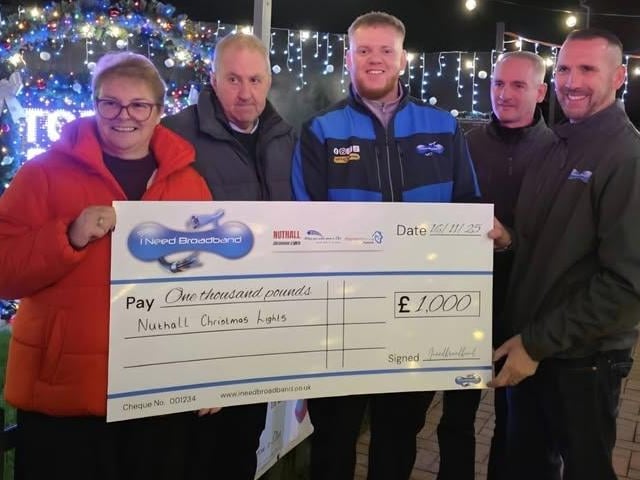 More than £3,000 was raised on the night, including this £1,000 donation from I Need Broadband Ltd.
