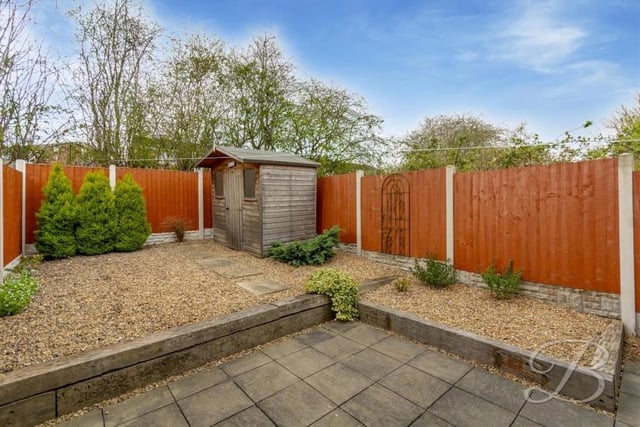 The split-level back garden includes a seating area, where you could entertain family or friends during the summer.