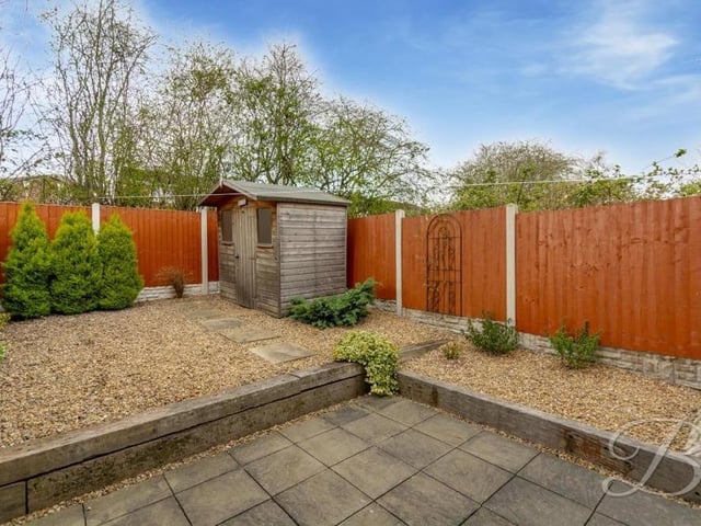 The split-level back garden includes a seating area, where you could entertain family or friends during the summer.