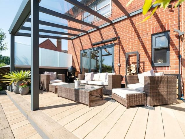 A highlight of the back garden is this sheltered terrace, with seating area. Sit back and relax or entertain family and friends.