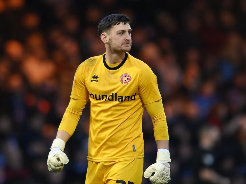 Barnsley have signed Walsall goalkeeper Jackson Smith for an undisclosed fee on a four-year deal.