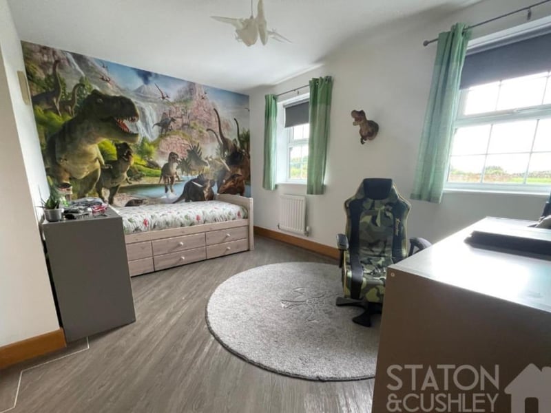 This is a bedroom that is even fitted for dinosaurs! Double-glazed windows face the front of the Sorrel Drive property and the room also boasts fitted wardrobes.