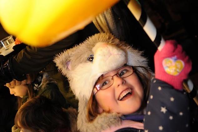 Ruby Quincey proudly shows off her prize after a successful turn on the hook-a-duck stand at the 2016 Mansfield Woodhouse fireworks event