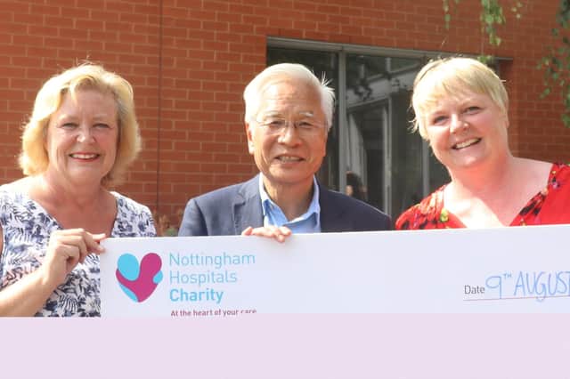 Newthorpe resident Sallyann Petts (right) with sister Jacqueline Sherwin and Professor Stephen Chan.