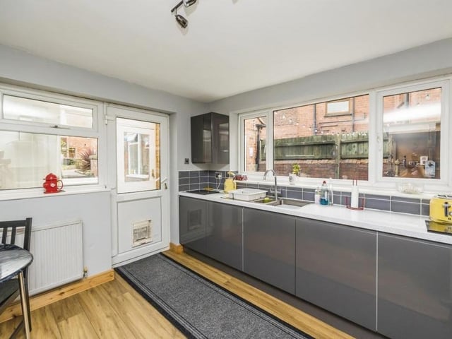 This is the kitchen from a different angle. It is such a good size that there is room for a breakfast or dining table. The door leads towards the courtyard and the garden.