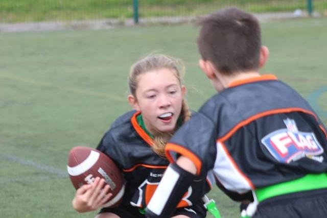 Both boys and girls play the game together, providing a fully inclusive experience.
