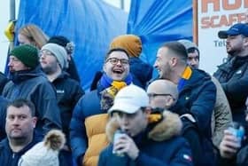 Kieran Halpin-Danby (laughing) and Terry Adams share a joke at a Stags game.
