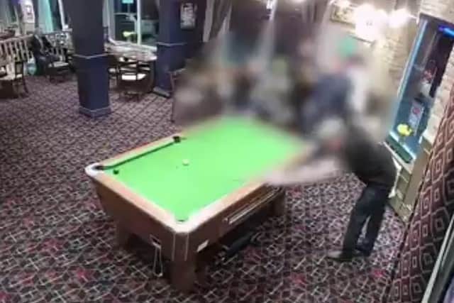 Moments before the stolen car hit the pub
